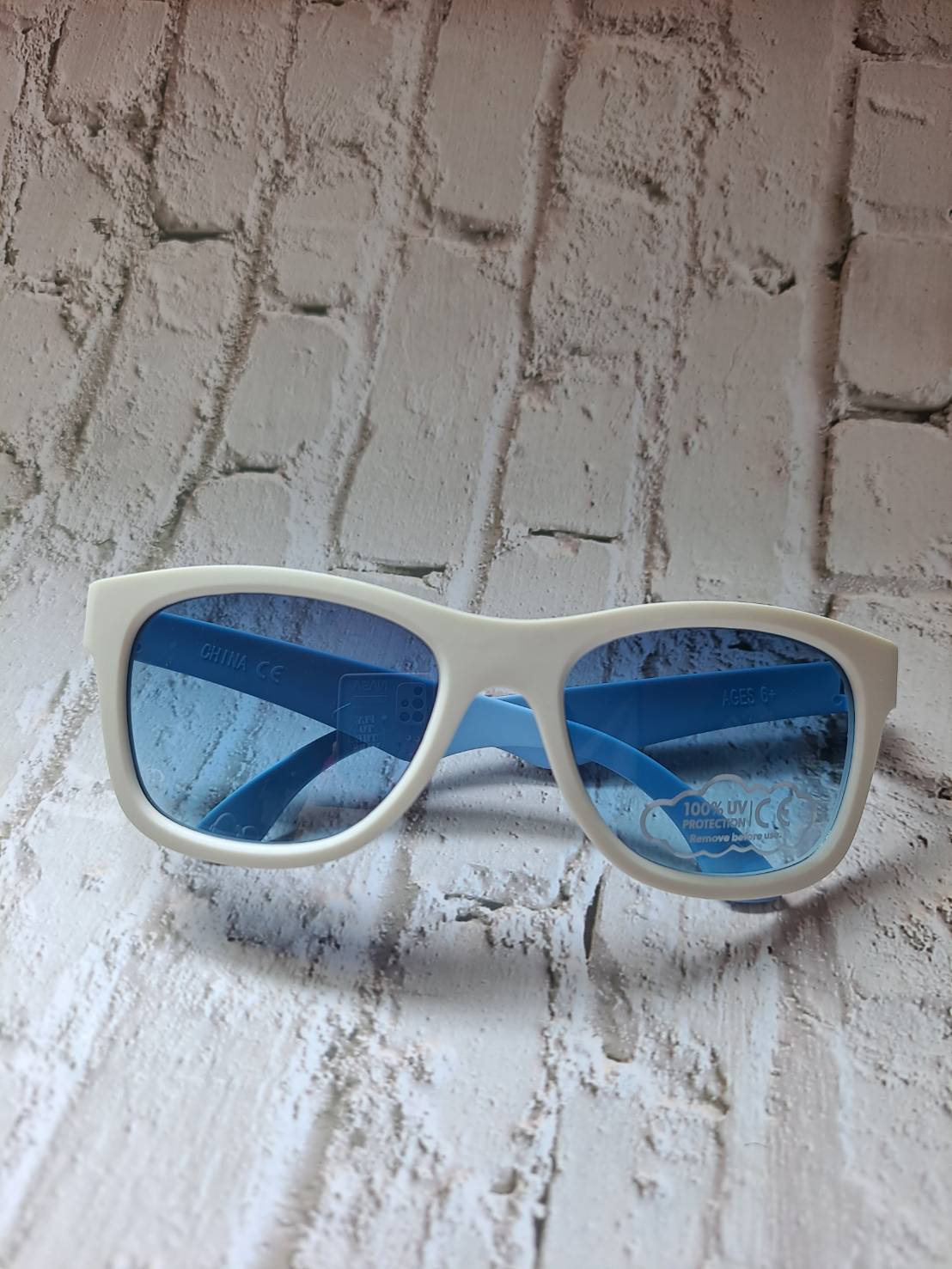 Babiators Fade to blue toe tone 6+y