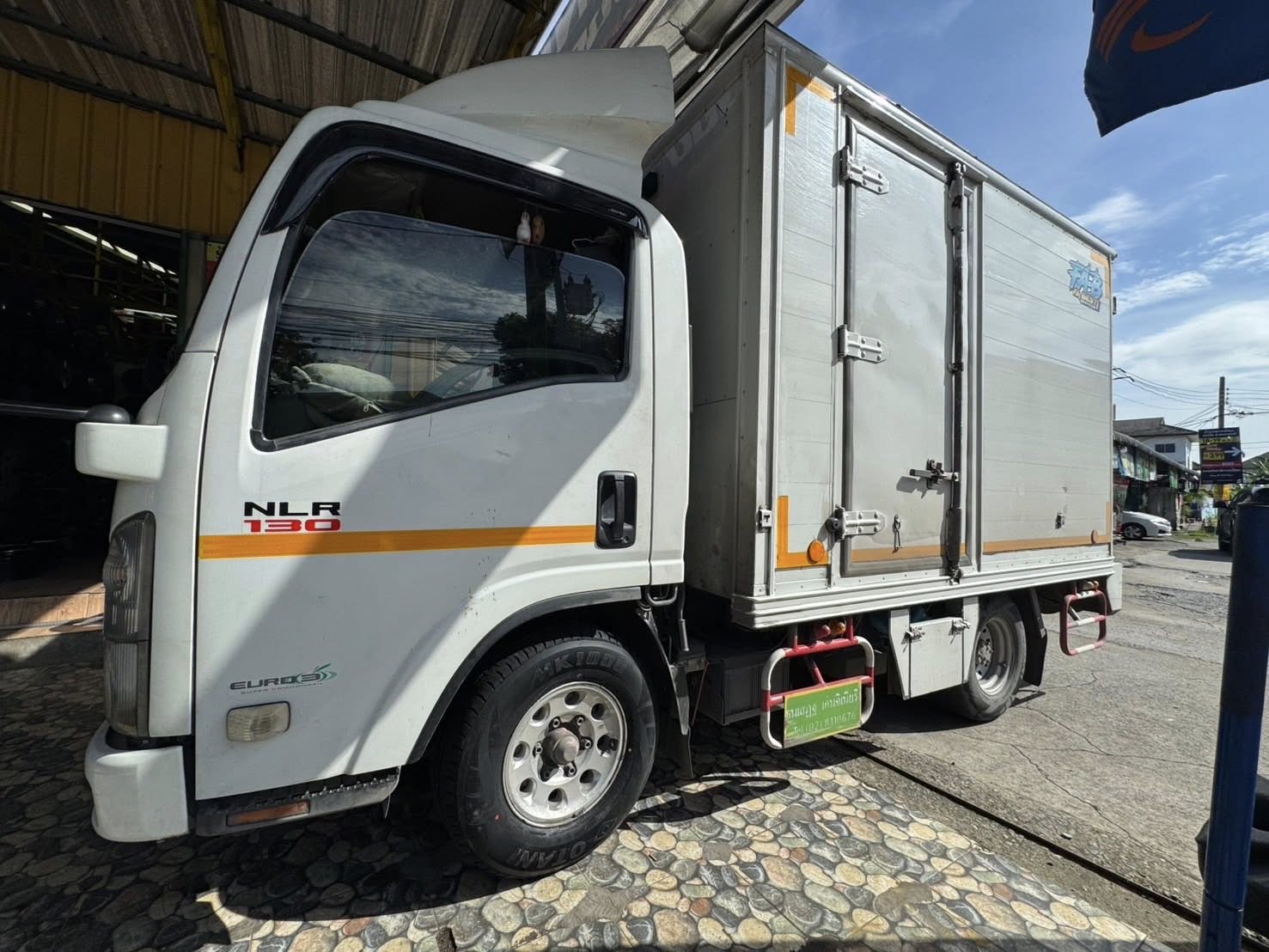 ISUZU_ELF🚘เปลี่ยนยาง 🛞🐘#OTANI_MK1000_225/75R15