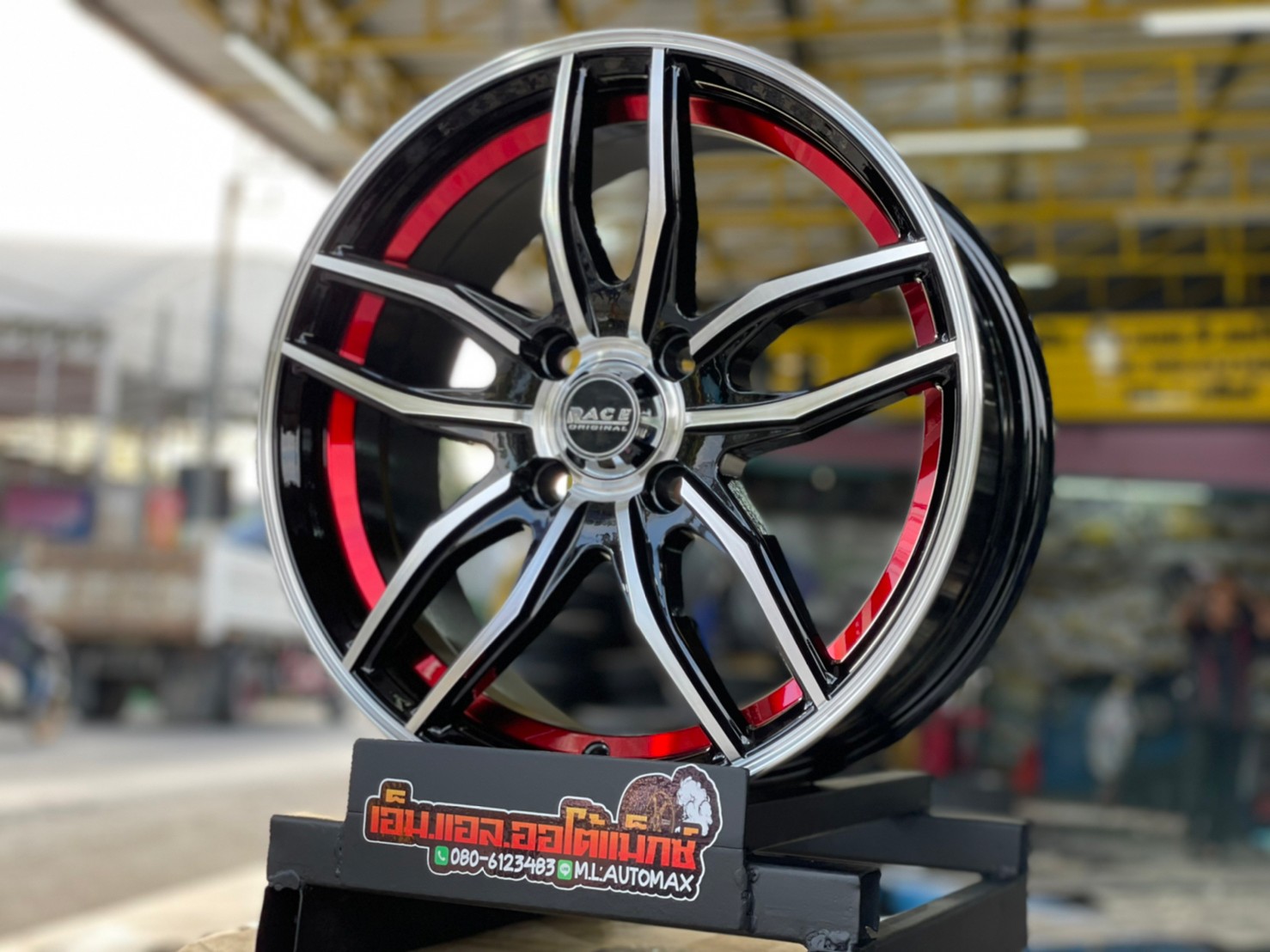 ล้อแม็กซ์ขอบ15 Wheel Performance Model WP-R10 กว้าง6.5 ออฟ35 4รู100 สีดำมิลลิ่งแดงหน้าเงา