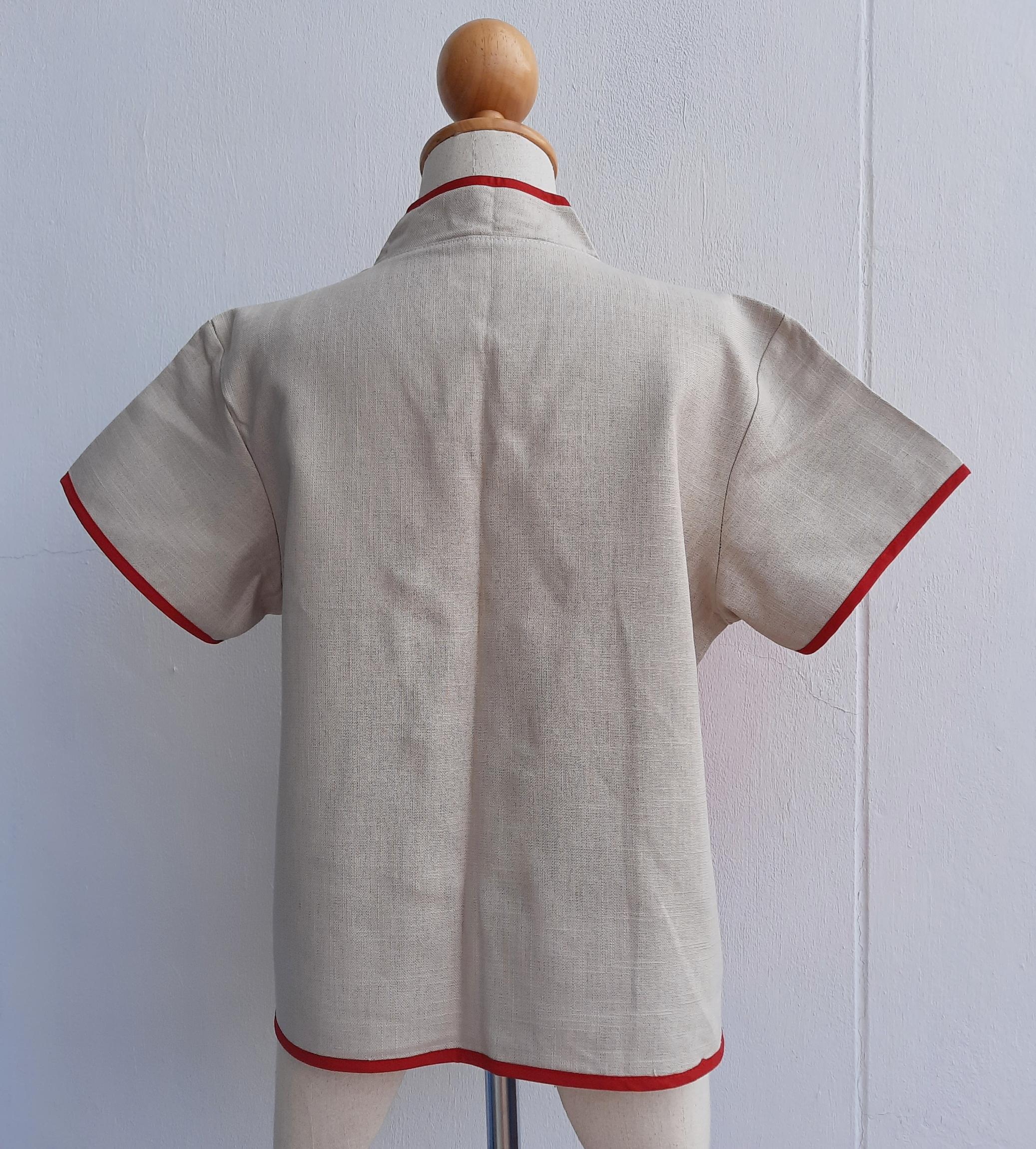 เสื้อผ้ากัญชงสีกรมท่าแต่งผ้าชาวเขา โทนเหลืองอมส้ม