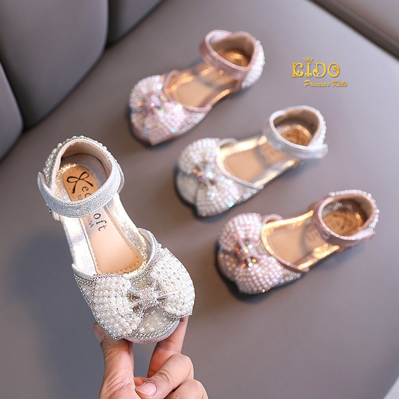 ssรองเท้าเด็กออกงาน(หน้าร้านอยู่รัชดา ลองได้)H058สีชมพู สีเงิน ติดมุกประดับเพชร แต่งด้วยโบว์ติดเพชรละมุก ระยิบระยับ เปิดข้าง แนวเจ้าหญิงน่ารัก