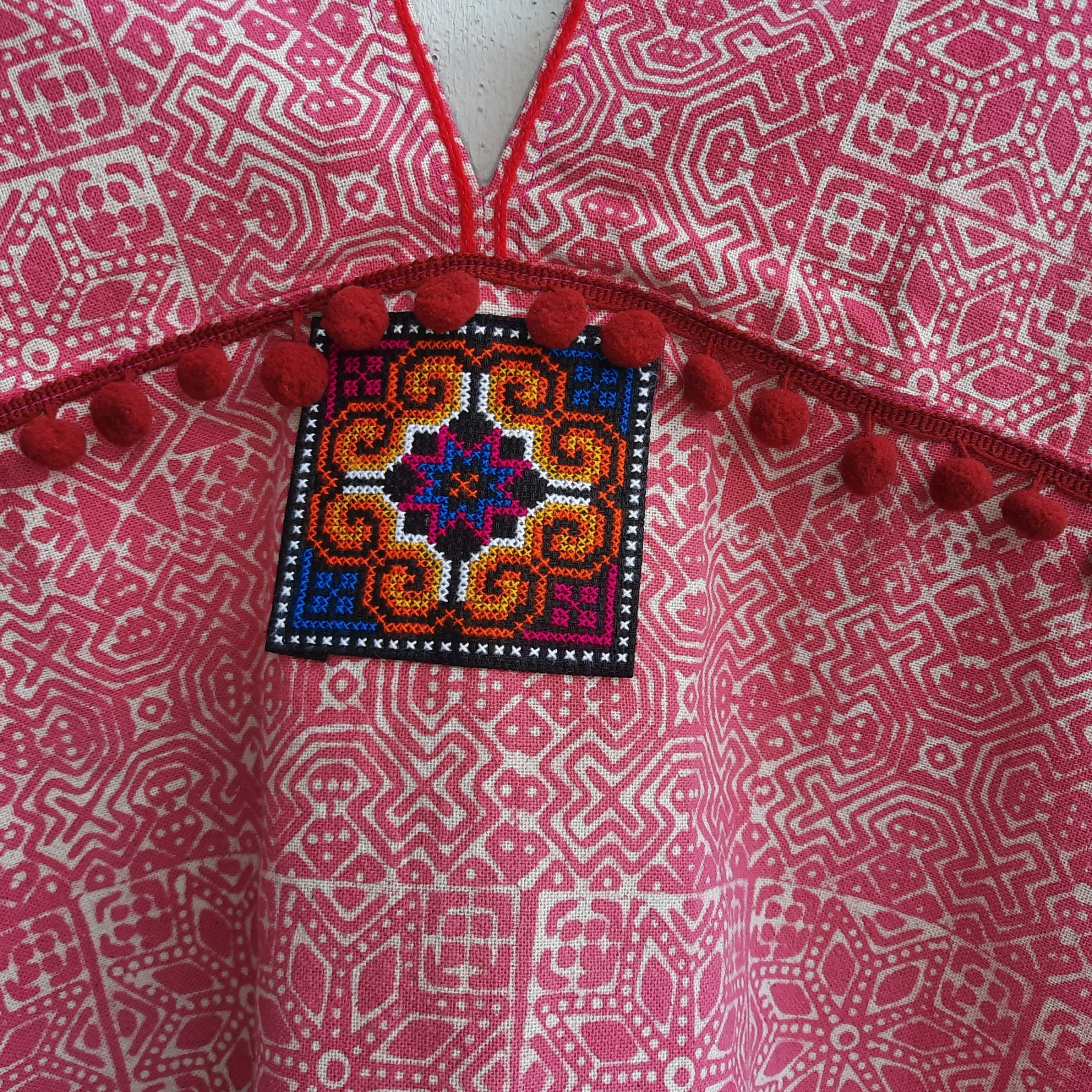 เสื้อเขียนเทียน สีชมพูอมส้ม