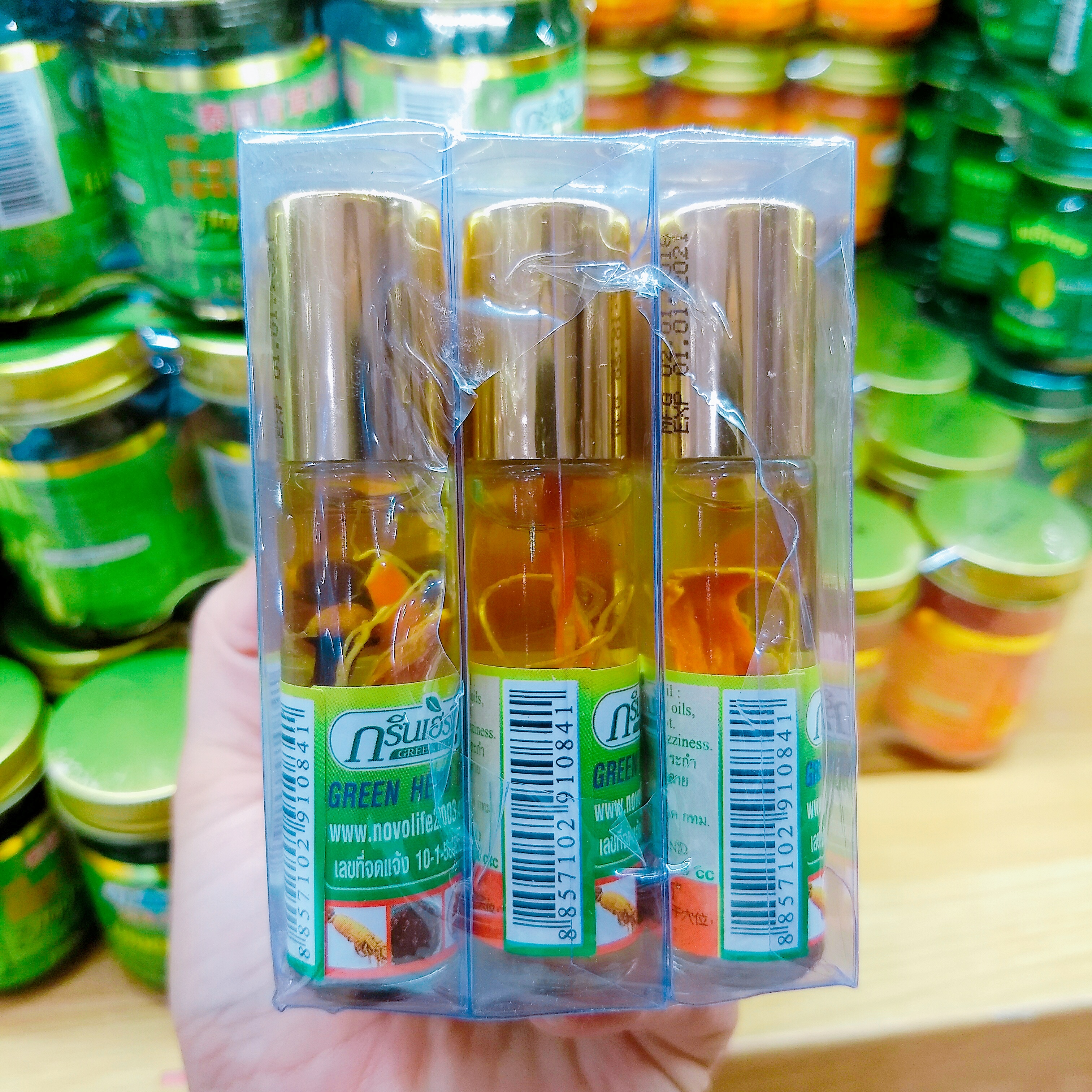 กรีนเฮิร์บ ยาหม่องน้ำสมุนไพรรากโสมขวด 8 cc.