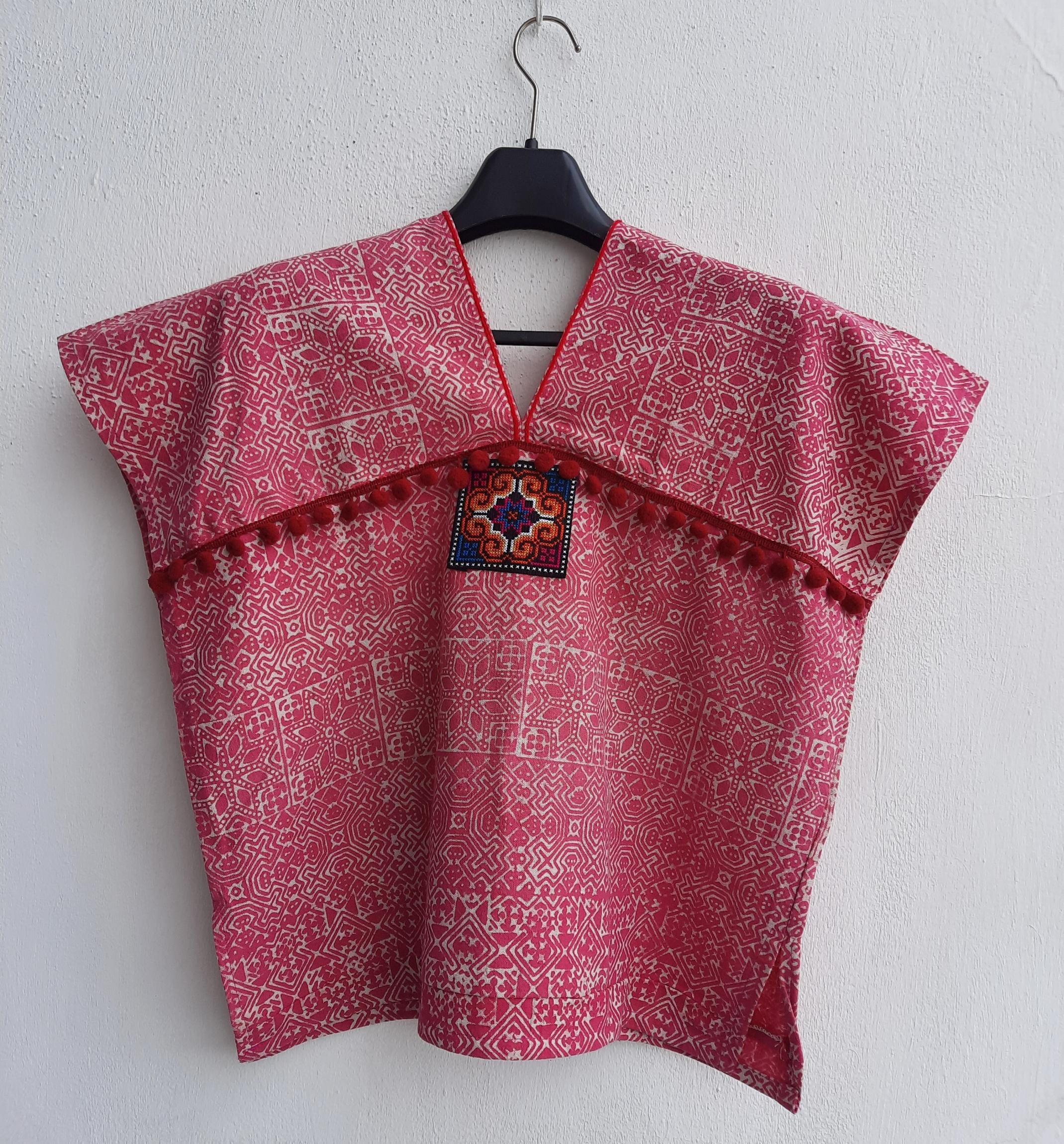 เสื้อเขียนเทียน สีชมพูอมส้ม