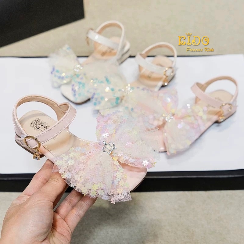 ssรองเท้าเด็กออกงาน(หน้าร้านอยู่รัชดา ลองได้)H063สีชมพู สีครีม แต่งด้วยโบว์ติดมงกุฎเพชร สายคล้องข้อเท้าห้อยดาว หวานๆน่ารัก ใส่สบายมาก