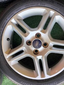 ล้อแม็กเดิมมือสอง FORD ER370ขอบ16" ขนาด4×100 พร้อมยางสภาพดียี่ห้อ BRIDGESTONE ER370 185/55R16