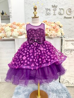 ชุดราตรีเด็ก(หน้าร้านอยู่รัชดา ลองได้ถ่ายรูปจากชุดจริง)B265สีม่วง หน้าสั้นหลังยาวประดับดอกไม้ทั้งตัว